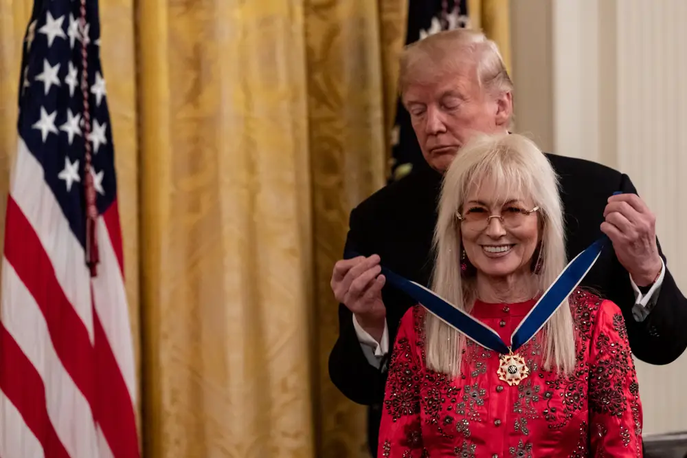 Former President Donald Trump is facing criticism for how he praised Miriam Adelson, whom he awarded the Presidential of Freedom to in 2018. (Credit: Cheriss May/NurPhoto via Getty)