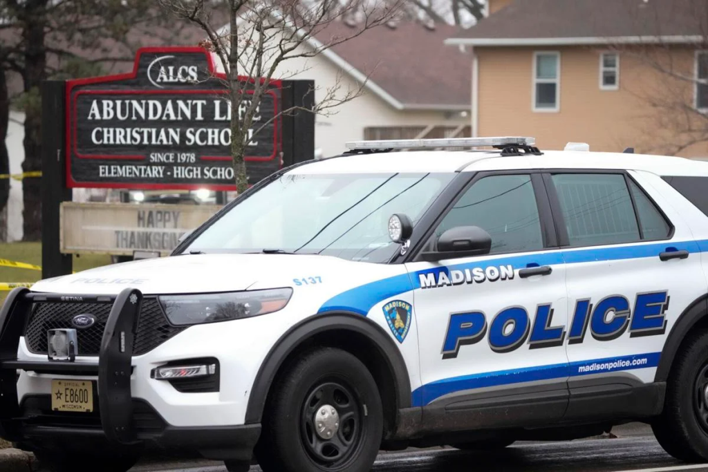 Wisconsin School Shooting: Shool Shooter Identified as Trans Wisconsin School Shooting: Transgender Student Identified as Madison Shooter at Christian School. (Image Credit: Morry Gash / AP)