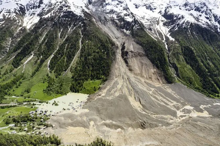 Aerial view shows the destruction of the Swiss glacier collapse, Thursday, May 29, 2025, one day after a massive debris avalanche, triggered by the collapse of the Birch Glacier, swept down to the valley floor and demolished large parts of the village. (Image Credit: JEAN-CHRISTOPHE BOTT / Keystone)