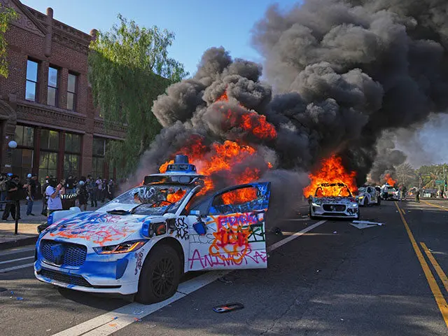 The Immigration Protests of ICE raids has turn into full blown riots in LA, forcing President Donald Trump to send in the marines and National Guard. (Image Credit: AP /Eric Thayer)