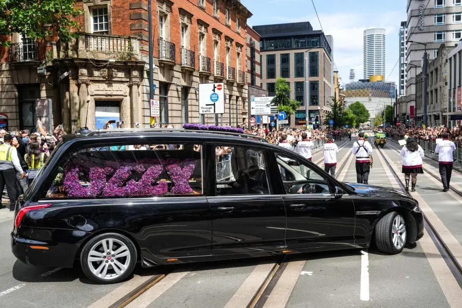 Thousands Gathered at Ozzy Osbourne Funeral Procession Through Birmingham 2 Ozzy's hearse weaved its way through the streets of Birmingham in front of thousands of fans. (Image Credit: Alamy)