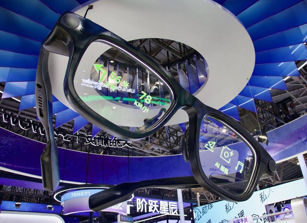 HTC Vive Eagle smart glasses with square lenses on a desk