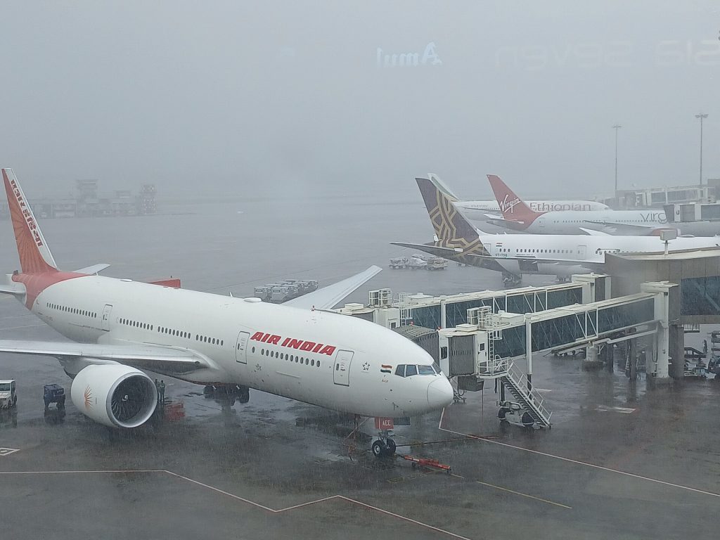 Aerial view of Chhatrapati Shivaji International Airport Mumbai with planes on the tarmac