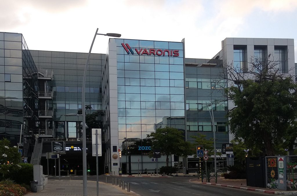Proofpoint to Buy Varonis for $6.3 Billion to Tackle AI Security Server room with network cables representing Proofpoint buy Varonis data security