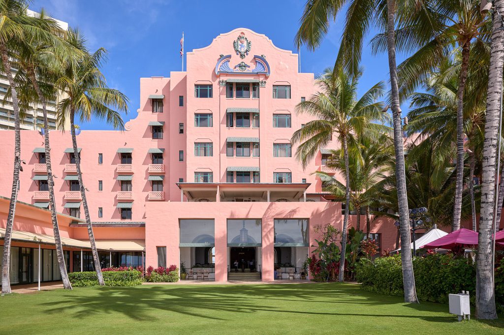 The iconic pink exterior of the Royal Hawaiian hotel in Waikiki