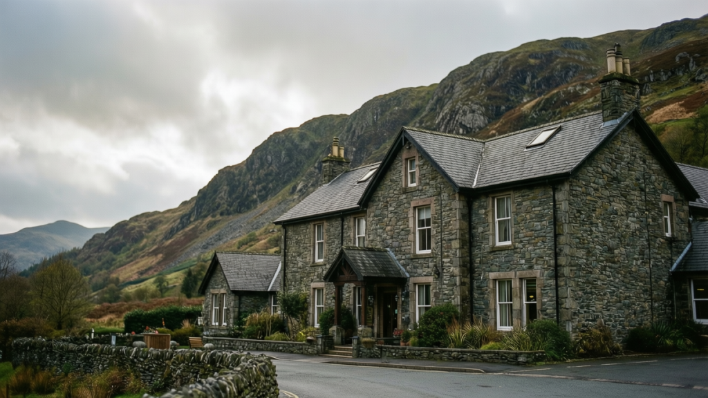 Pen-Y-Gwryd hotel exterior in Snowdonia with mountains in background