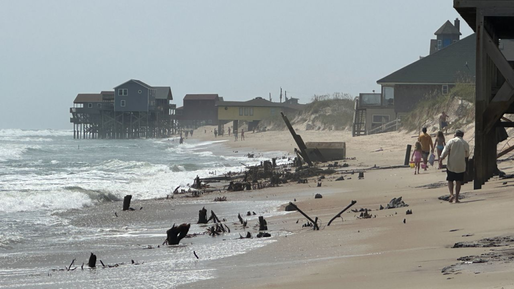 Another Outer Banks House Collapses Into the Ocean 1 Debris remains on the beach after an unoccupied house in Rodanthe, Dare County, was washed into the ocean Friday evening by swells caused by Hurricane Ernesto. (Image Credit: Spectrum News 1 / Lauren Howard)