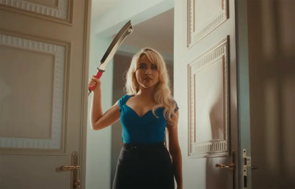 Sabrina Carpenter and Jenna Ortega's New Gory ‘Taste’ Music Video 2 Sabrina Carpenter holds a machete in her new “Taste” music video. (Credit: Sabrina Carpenter / YouTube)