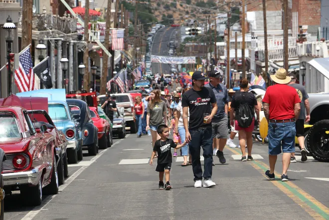 People checking out the cars during opening day for Hot August Nights in Virginia City on Aug. 2, 2024. (Credit: Jason Bean / Reno Gazette Journal)