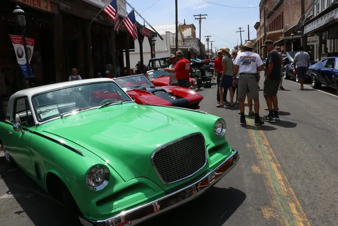 People checking out the cars during opening day for Hot August Nights in Virginia City on Aug. 2, 2024. (Credit: Jason Bean / Reno Gazette Journal)