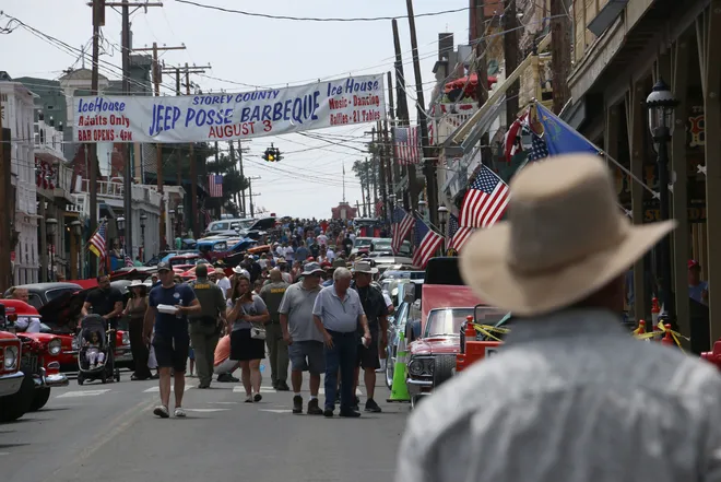 People checking out the cars during opening day for Hot August Nights in Virginia City on Aug. 2, 2024. (Credit: Jason Bean / Reno Gazette Journal)
