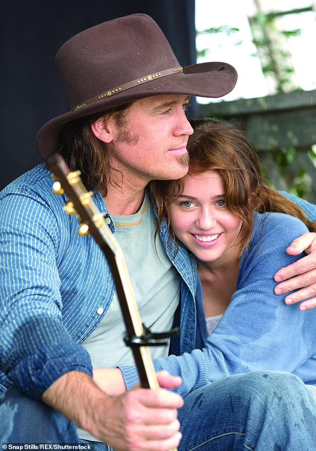 Miley Cyrus Makes History as Youngest Disney Legend at D23 Expo 2024 2 Miley and her dad Billy Ray pictured in 2009 on set of Hannah Montana: The Movie. (Credit: Snap Stills / Shutterstock)