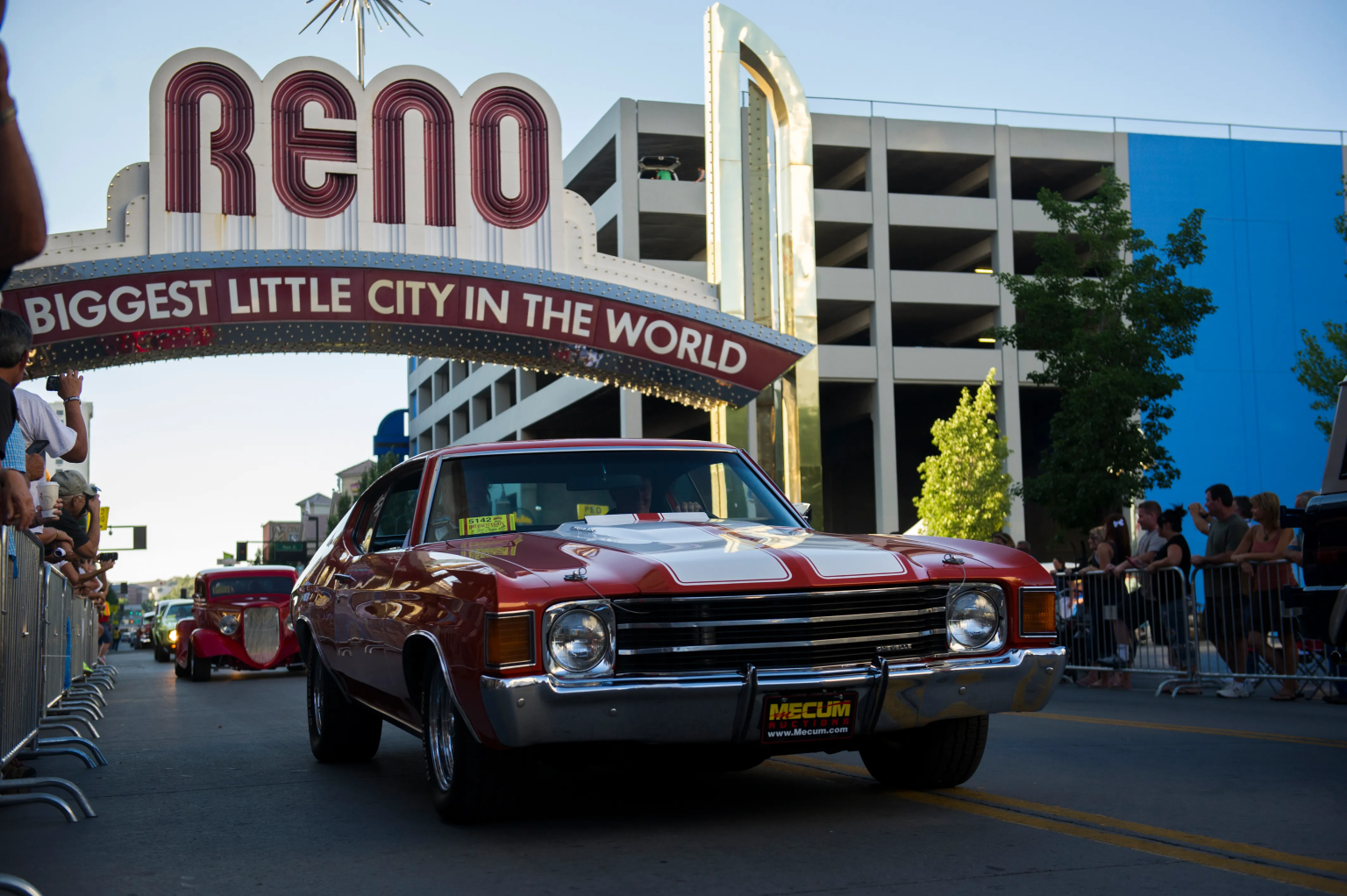 Vintage cars line up Virginia Street in downtown Reno during Hot August Nights on August 2, 2014. (Credit: Julie Dawes / Reno Gazette Journal)