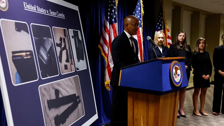 Sean "Diddy" Combs And The 1,000 Bottles Of Baby Oil: A Closer Look At The Indictment 1 U.S. Attorney Damian Williams pointed at a chart Tuesday showing the firearms seized during the search of Sean "Diddy" Combs' homes, as well as more than 1,000 bottles of baby oil and lubricant. (Image Credit: Shannon Stapleton / Reuters)
