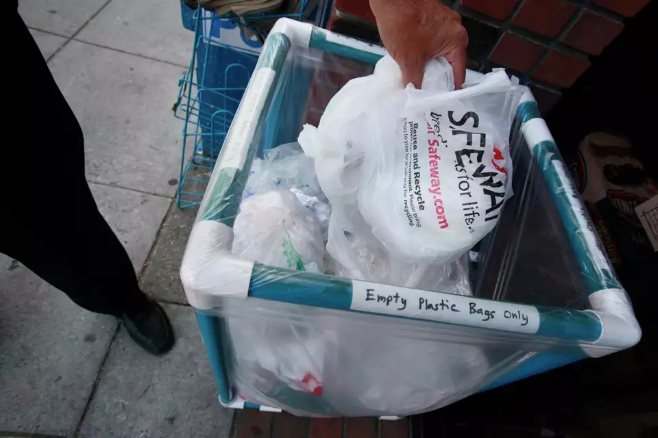 California Bans Plastic Bags Again: What You Need to Know 3 A customer puts plastics bags in a recycling can at a grocery store in Palo Alto in 2010. (Image Credit: Paul Sakuma/Associated Press)