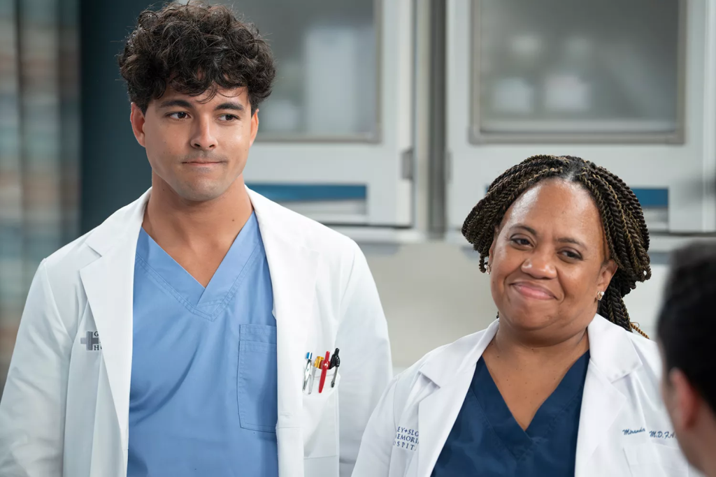 Grey’s Anatomy Season 21 Premiere: A Dramatic Return With Twists, Blackmail, And Big Decisions 2 Niko Terho (Lucas Adams) and Miranda Bailey (Chandra Wilson) on "Grey's Anatomy". (Image Credit: Anne Marie Fox / Disney)