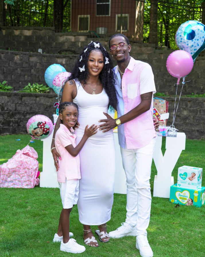 Rich Homie Quan with his girlfriend, Amber “Rella” Williams, and son Royal Lamar, 10. (Image Credit: Instagram @Amber “Rella” Williams)