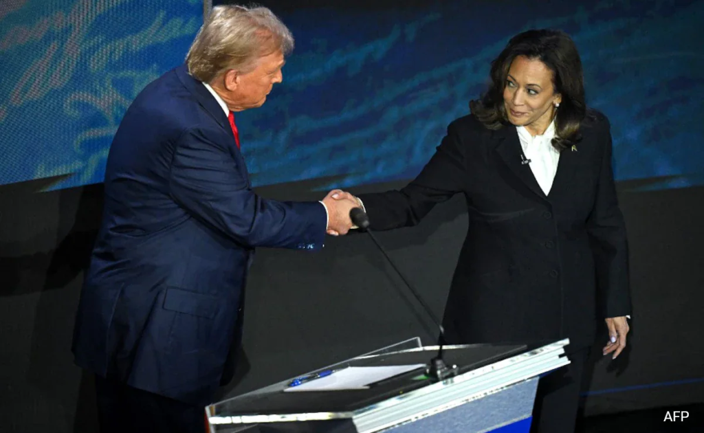 Debate Polls: Harris Vs. Trump-Who Came Out On Top? 1 Donald Trump v Kamala Harris: Republican presidential nominee and former U.S. President Trump and Democratic presidential nominee and US Vice President Harris shake hands as they arrive at their podiums to attend a presidential debate hosted by ABC in Philadelphia, on September 10, 2024. (Image Credit: ABC News)