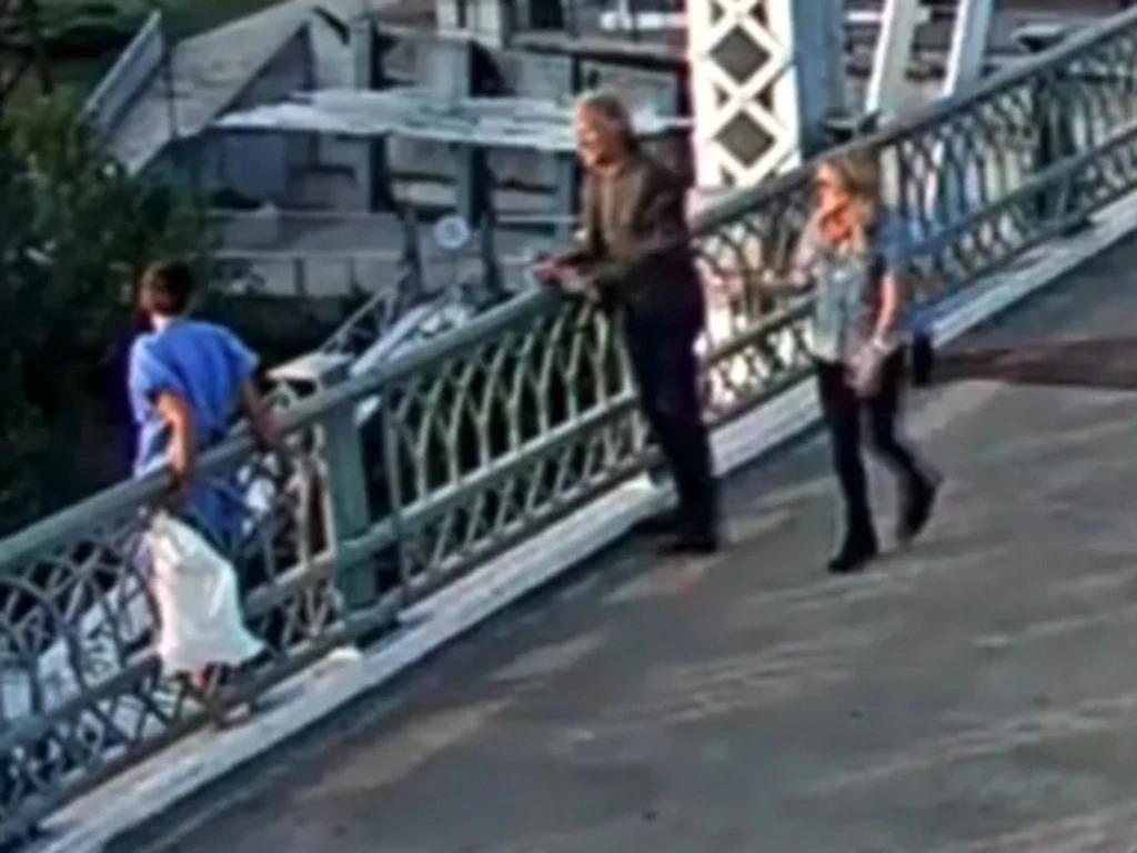 Bon Jovi Saves Woman From Suicide on Nashville Pedestrian Bridge 1 While filming a music video, the "Livin' on a Prayer", Jon Bon Jovi spotted the woman standing on the bridge's ledge over the Cumberland River and intervened. (Image Source: Metropolitan Nashville Police Department)