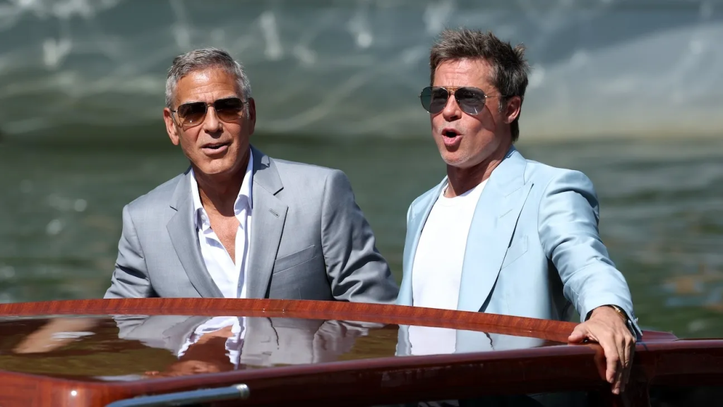 Brad Pitt And George Clooney Shine In New Movie “Wolfs” At Venice Film Festival Brad Pitt and George Clooney made waves at the Venice Film Festival with the premiere of their latest film, "Wolfs." (Credit: Getty Images)