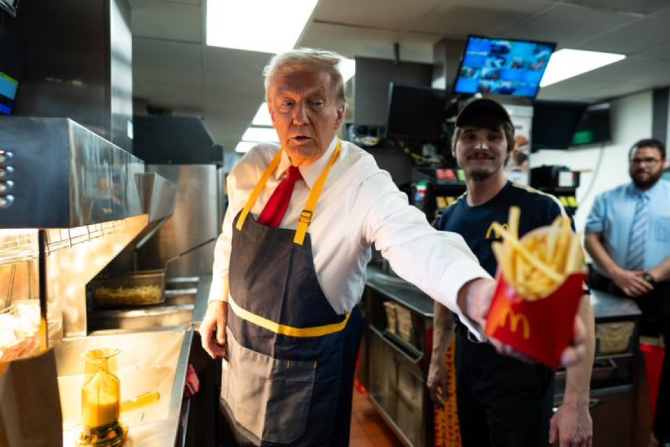 The stunt "Trump working at McDonald's" might just be a photo op at the end of the day, but the Former President has definitely improved his image on the final lap of the Presidential Race. (Image Credit: Reuters)