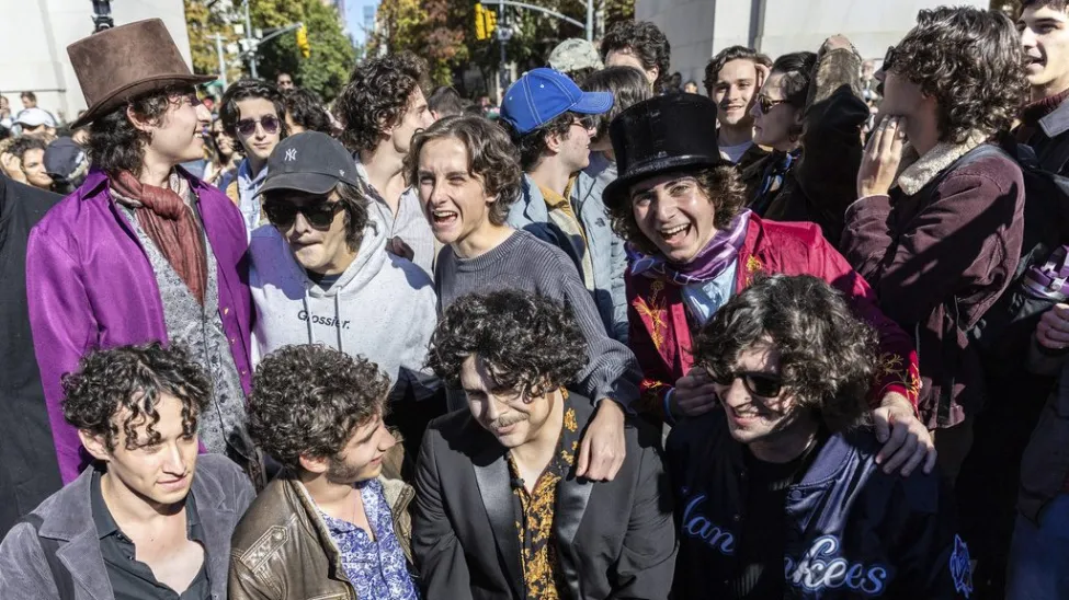 Timothée Chalamet Crashes Look-Alike Contest in New York City 1 Contestants gather for the Timothée Chalamet lookalike contest in Washington Square Park, Sunday, Oct. 27, 2024, in New York. (Image Credit: AP / Stefan Jeremiah)