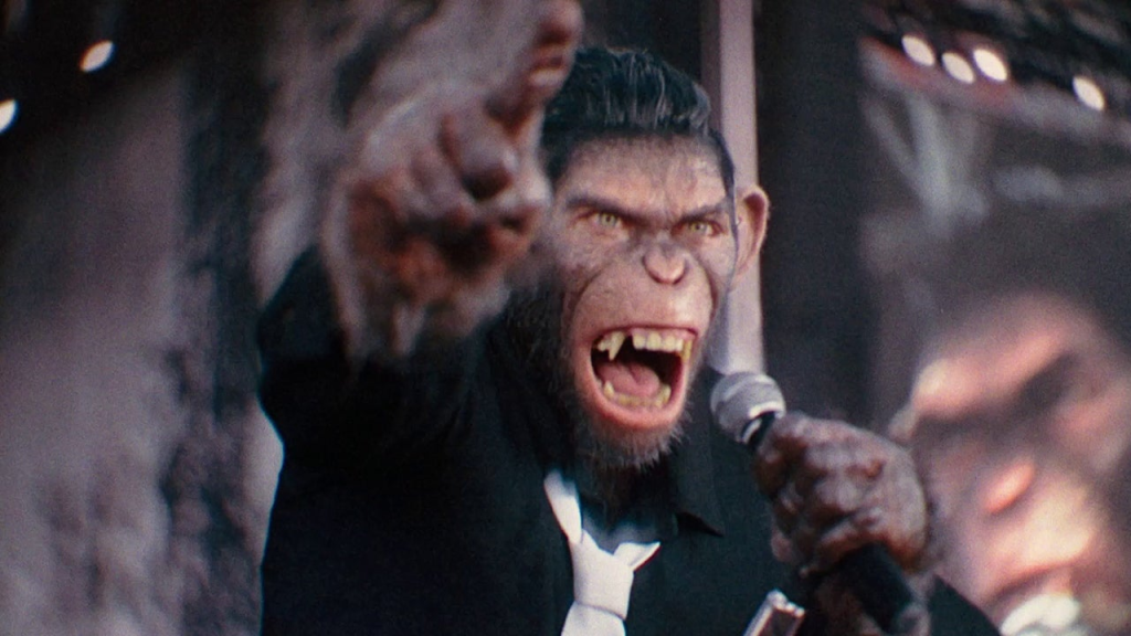 The Robbie Williams movie, Better Man, tells the story of his life in a way that only Williams could envision—through the lens of a CGI monkey. (Image Credit: Paramount Pictures)
