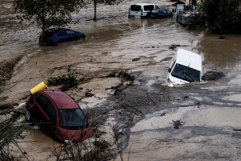 Spain Floods Latest: Flash Flooding In Valencia Claims 95 Lives, With Dozens Still Missing 1 Cars are being swept away by the water, after flooding in Spain preceded by heavy rains caused the river to overflow its banks in the town of Alora, Malaga, Spain, Tuesday, Oct. 29, 2024. Flash flooding in Spain has swept away cars, turned streets into rivers, cut off entire communities and killed at least 51 people so far. (Image Credit: Gregorio Marrero / AP)