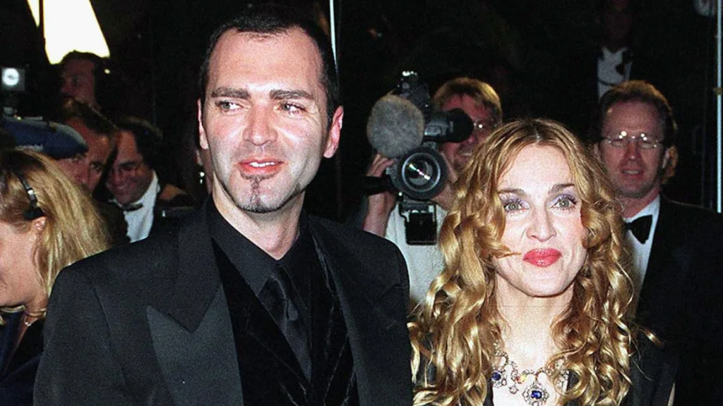 Christopher Ciccone (left) and Madonna at the 1998 Vanity Fair Oscar Party at in West Hollywood. Christopher Ciccone cause of death was due to cancer. (Credit: John Chaple/Getty Images)