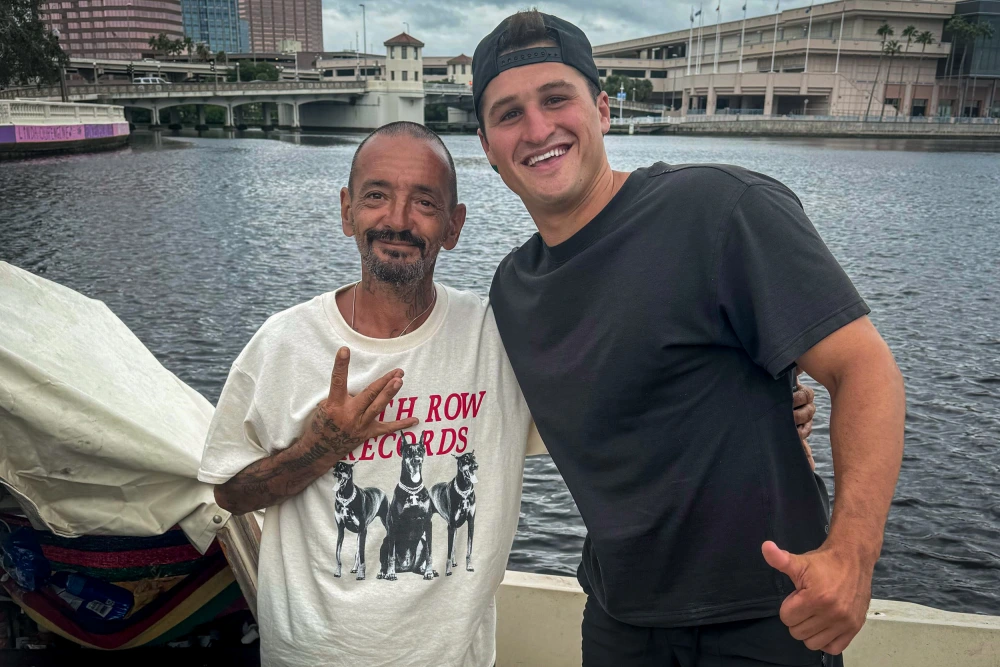 Lieutenant Dan Tampa Battle With Hurricane Milton: A Viral TikTok Sensation Ignites Concern And Hope 1 Joseph Malinowski (left), also known as "Lieutenant Dan Tampa" and Terrence Concannon. (Image Credit: Terrence Concannon)