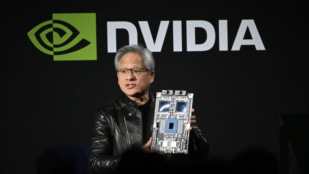 Nvidia Earnings Report: AI Surge But Stock Falters 1 Jensen Huang, co-founder and chief executive officer of Nvidia Corp. (NVDA Stock), holds up the company’s AI accelerator chips for data centers as he speaks during the Nvidia AI Summit Japan in Tokyo, Japan, on Wednesday, Nov. 13, 2024. (Image Credit: Akio Kon | Bloomberg)