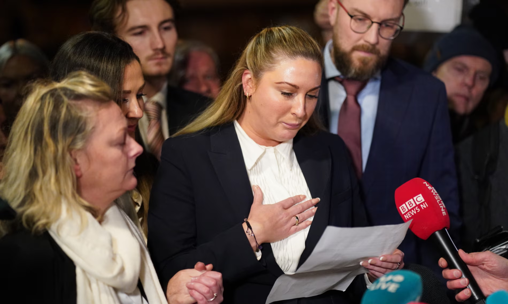 Nikita Hand, centre, speaks to the media on Friday in Dublin after the verdict. (Image Credit: Brian Lawless/PA)