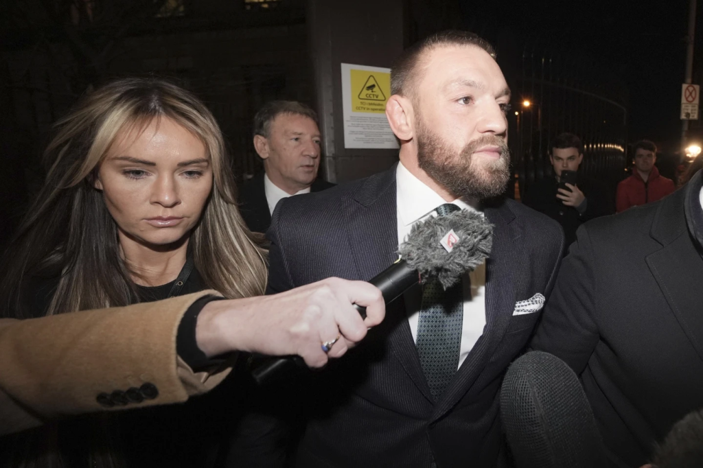 Conor McGregor wife and partner Dee Devlin leave the High Court in Dublin, Ireland, Friday, Nov. 22, 2024. (Image Credit: Brian Lawless /  AP)