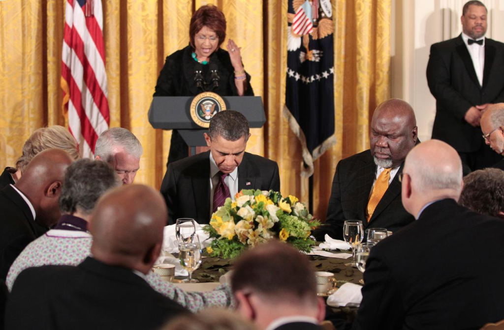 Bishop T.D. Jakes Suffers Medical Emergency At Sunday Sermon 2 Bishop T.D. Jakes (right) and Former-President Obama praying during the White House Easter Prayer Breakfast (Image Credit: AP Photo / Pablo Martinez Monsivais)