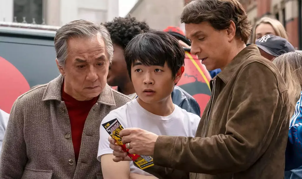 Karate Kid: Legends – Cobra Kai Ties In, Cast and Plot 2 From left to right, Jackie Chan (Mr. Han), Ben Wang (Li Fong), and Ralph Macchio (Daniel LaRusso) in Karate Kid: Legends trailer. (Image Credit: Sony)