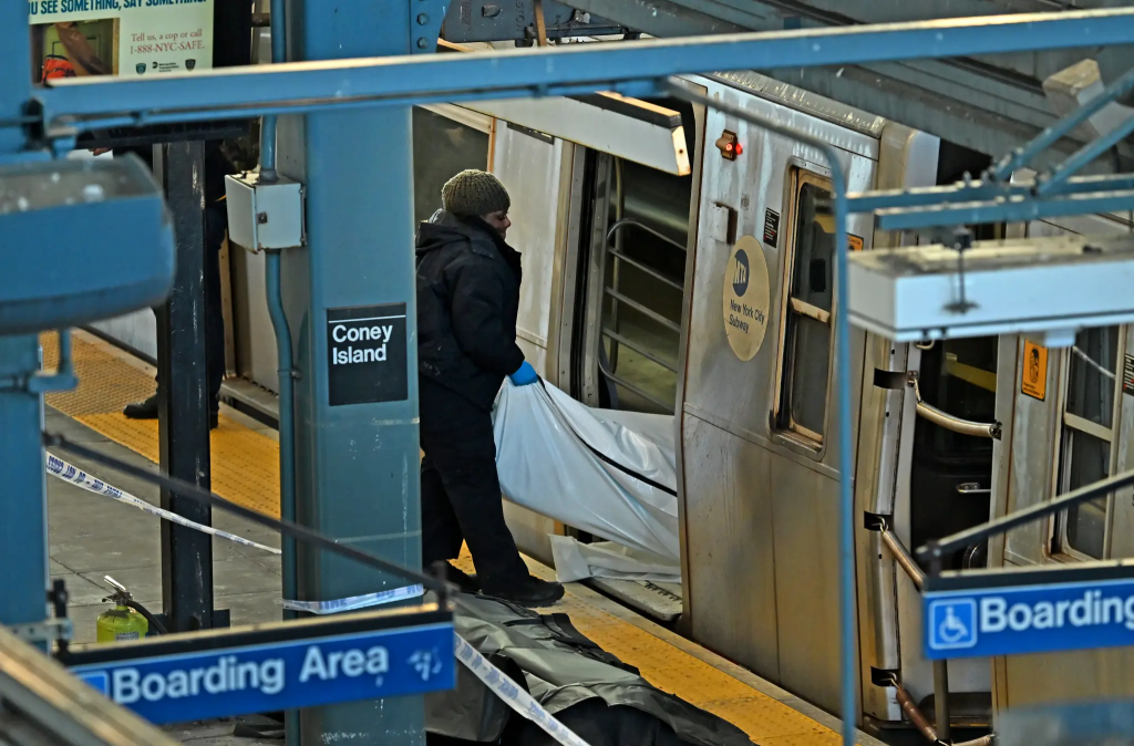 Guatemalan Migrant Arrested in New York Subway Fire Murder 2 The woman New York Subway victim died at the scene. (Image Credit: Gregory P. Mango / AP)