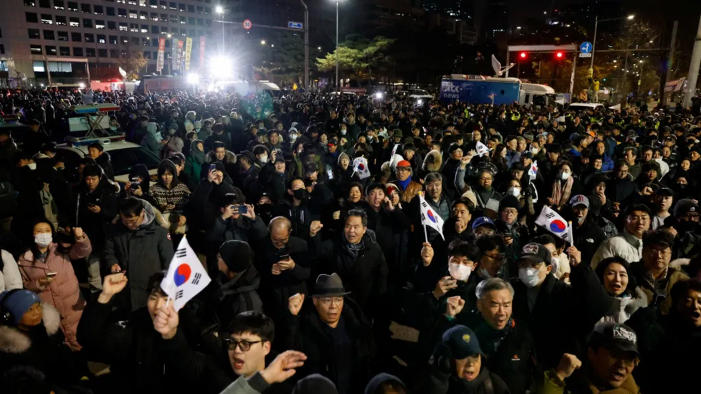 Why Did South Korea Martial Law Was Suddenly Declared? 4 Protesters outside parliament on Tuesday night to protest against the sudden martial law in South Korea. (Image Credit: Reuters)