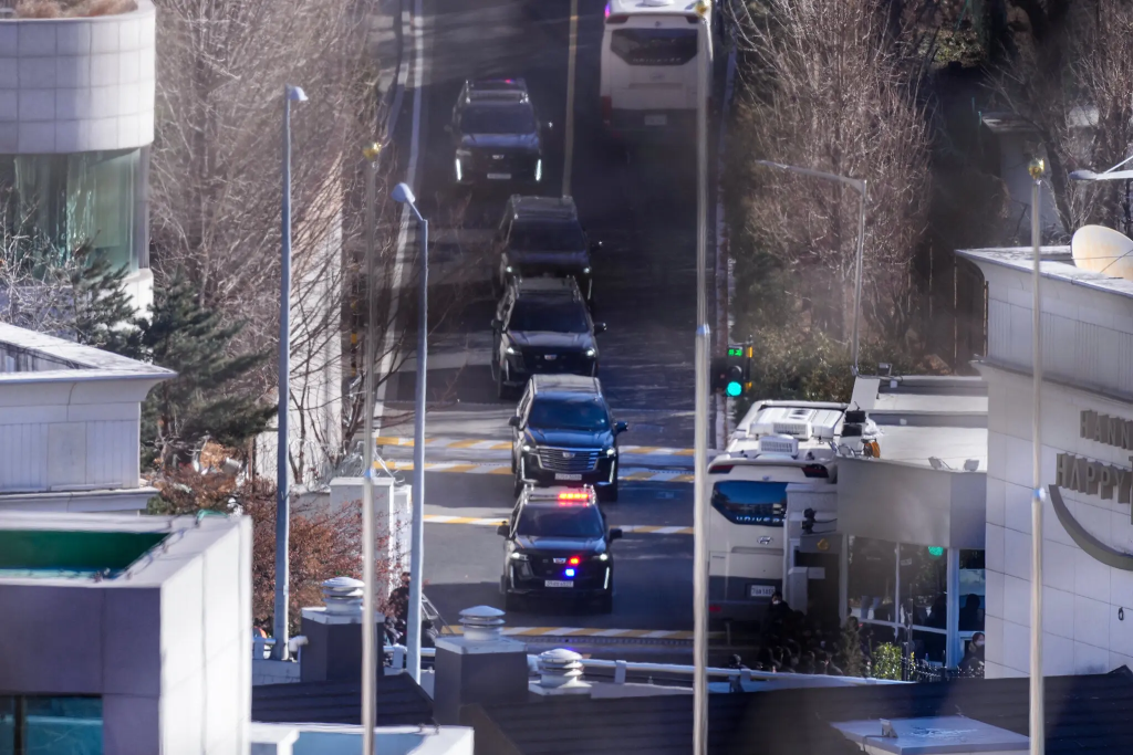 South Korea President Yoon Suk Yeol Arrested After Stand Off 2 A motorcade taking President Yoon Suk Yeol away from his residence in Seoul on Wednesday morning. (Image Credit: Jun Michael Park / The New York Times)