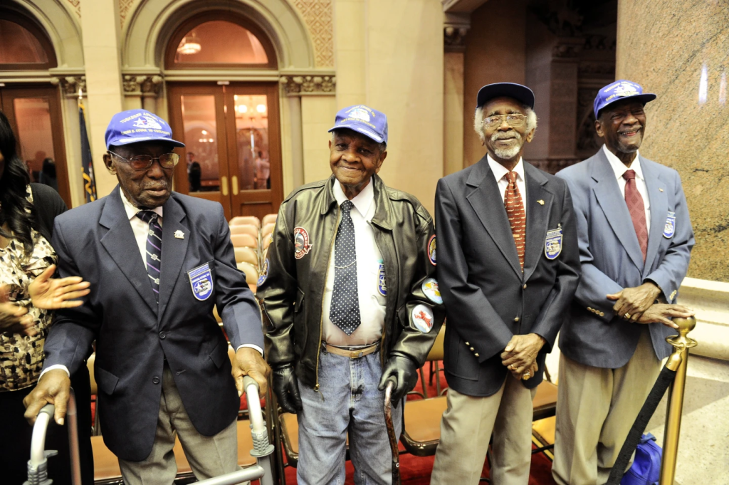 Tuskegee Airmen Training Videos Removed By Shift On DEI 2 Tuskegee Airmen (from left to right) Audley Coulthurst of New York, William Johnson of Glen Cove, N.Y., Wilfred R. DeFour of New York, and Herbert C. Thorpe of Rome, N.Y. (Image Credit: Hans Pennink / AP)