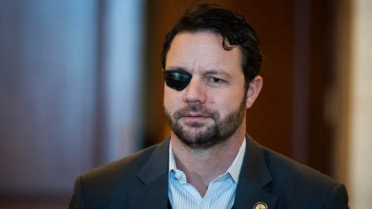 Who Is Dan Crenshaw? Texan Rep Threatens Kill Tucker Carlson 1 Texas Republican Congressman Dan Crenshaw appeared to threaten former Fox News host Tucker Carlson. (Credit: Getty Images)