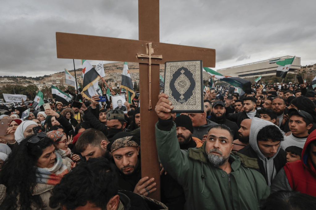 Hundreds of Christians Slaughtered in Syria Less Than 24 Hours Global Outrage as Over 340 Christians Slaughtered in Syria. (Image Credit: Omar Sanadiki / AP)