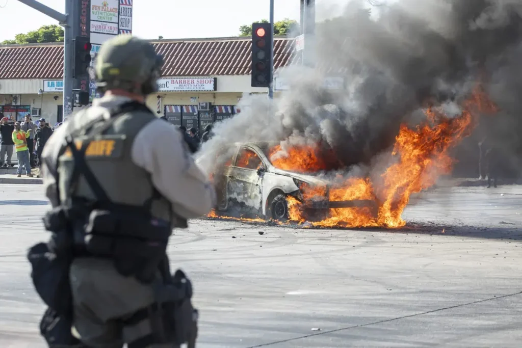 National Guard Arrives in California Amid LA Riot Law enforcement clashes with LA riot demonstrators during a protest following federal immigration operations, in Compton, California on June 7, 2025. (Credit: Getty Images)