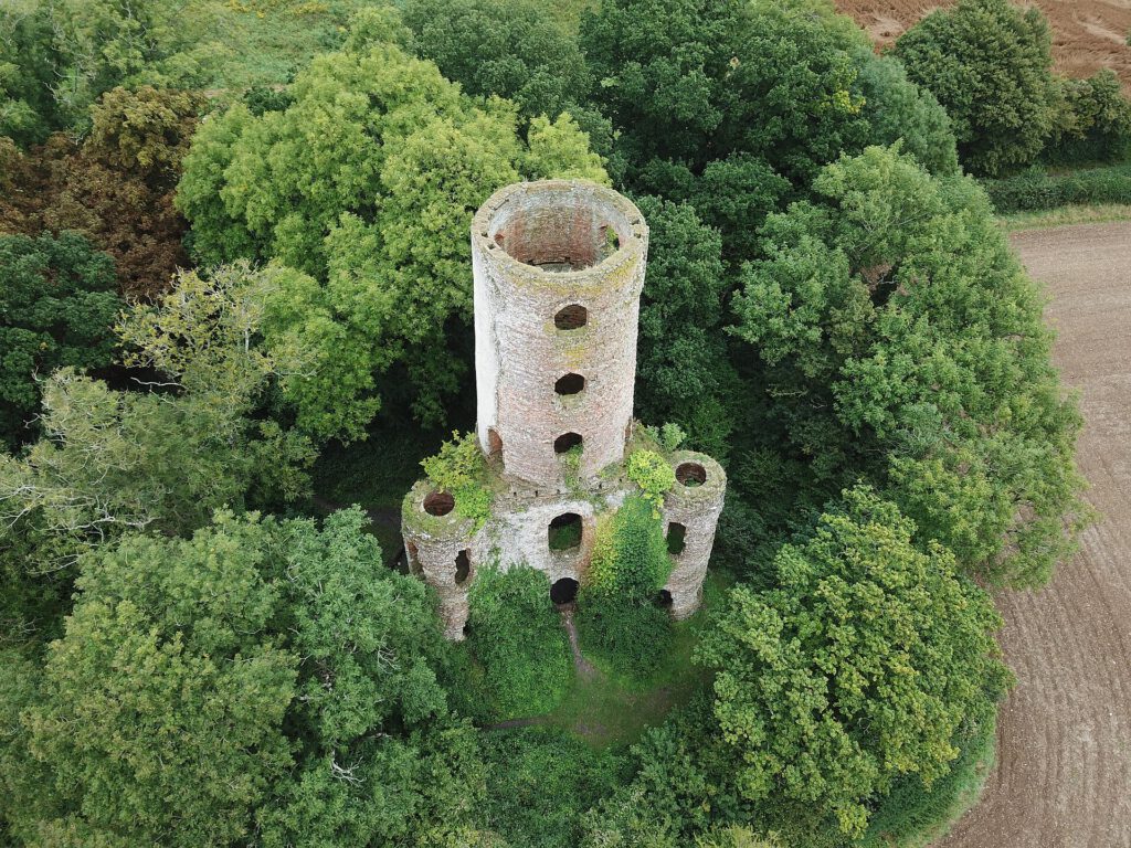 10 Eerie British Sites for Halloween Eerie view of the Racton Monument folly in Sussex, a spooky place in Britain