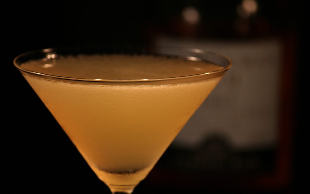 All Roads Daiquiri Recipe: Scotch Bonnet Jam Twist All Roads daiquiri in a coupe glass with pineapple garnish