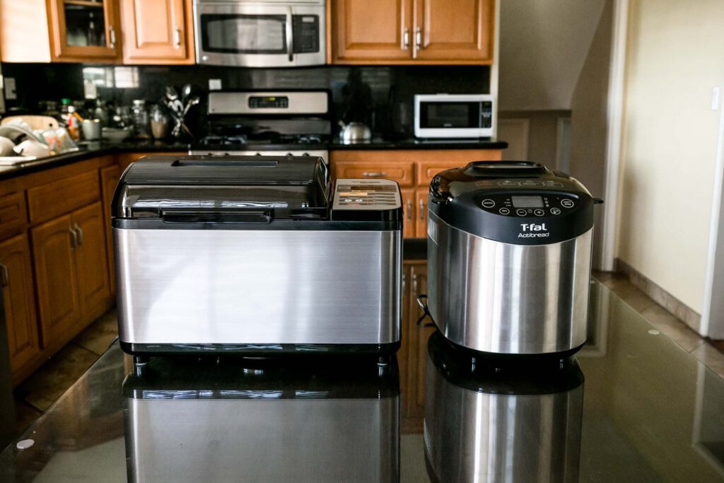 Best Bread Makers 2026: Panasonic Mini Wins After 36 Loaves Tested Panasonic mini bread maker on a kitchen counter with fresh bread