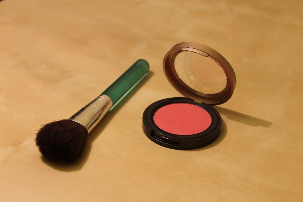 Close up of cream blush sticks on a table