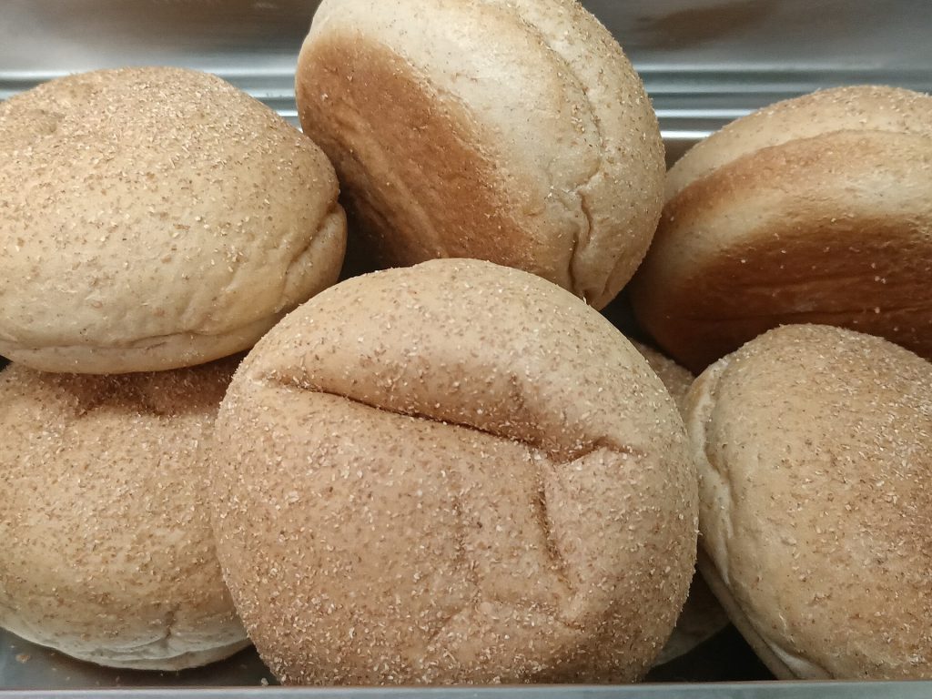 Best Supermarket Wholemeal Bread Tasted and Rated Sliced wholemeal bread on a wooden board