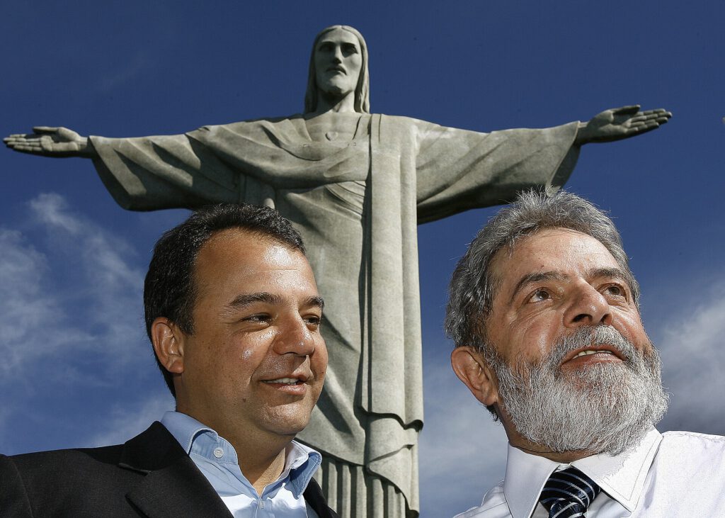 Crowd of supporters at a Brazil election run-off rally with Brazilian flags