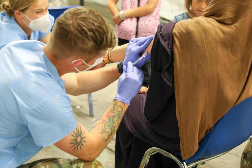 21st TSC gives Afghan evacuees Measles vaccine