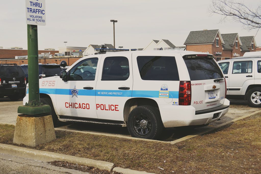 Police officers searching for synthetic drugs in a Chicago jail facility